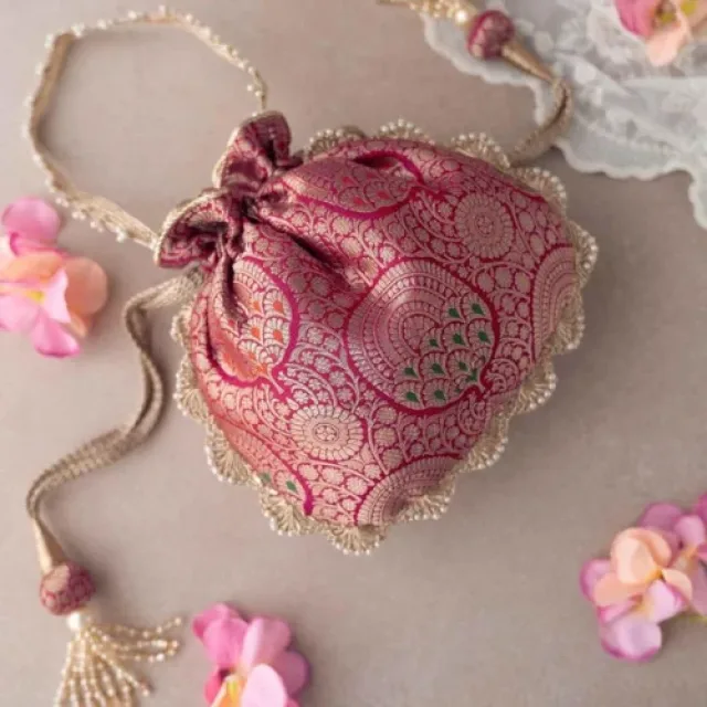 Embroidered Brocade Potli Bag with Pearl Tassels